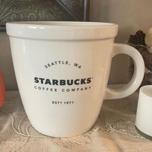 The 2016 Starbucks ceramic over-sized mug
 10" tall. 9" 3/4 top diameter.